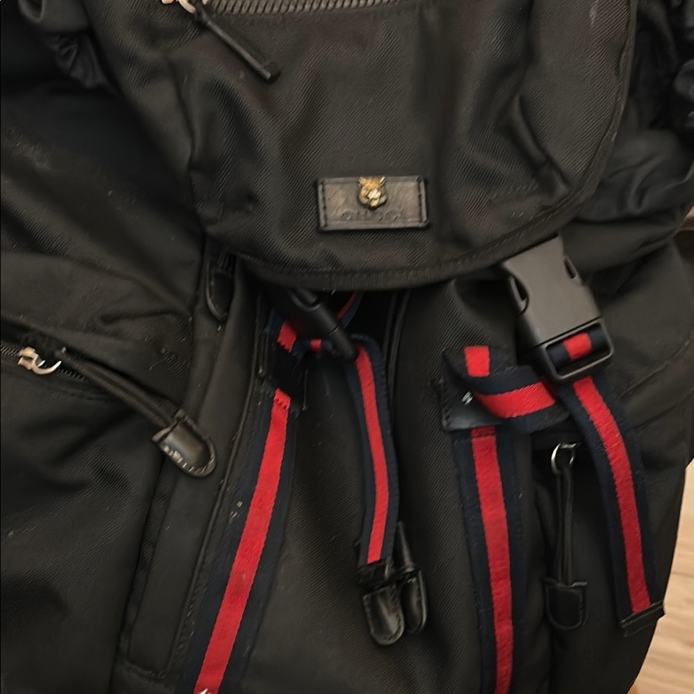 Gucci Black Backpack with Red Accents and Durable Fabric